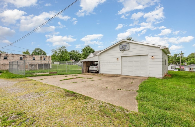 12 E Vine St, Jackson, OH 45640 - garage featuring driveway and a garage