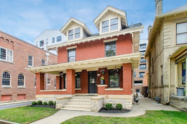 37 W 2nd Ave, Columbus, OH 43201 - traditional style home featuring brick siding and covered porch