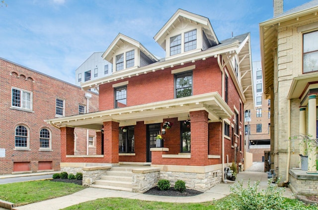 37 W 2nd Ave, Columbus, OH 43201 - traditional style home with brick siding and covered porch