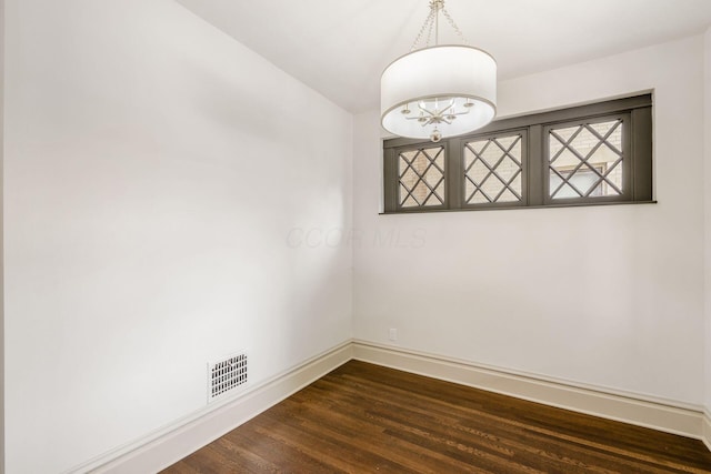37 W 2nd Ave, Columbus, OH 43201 - unfurnished room featuring baseboards and dark wood-style flooring