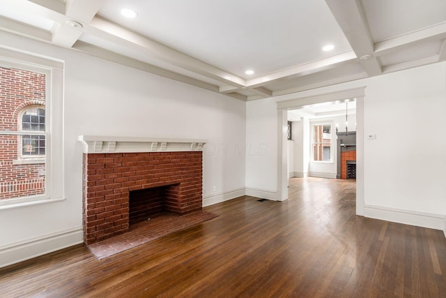 37 W 2nd Ave, Columbus, OH 43201 - unfurnished living room with a fireplace, coffered ceiling, wood finished floors, beamed ceiling, and baseboards