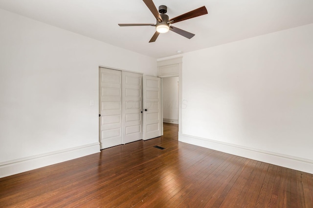 37 W 2nd Ave, Columbus, OH 43201 - unfurnished bedroom featuring hardwood / wood-style floors, a closet, baseboards, and a ceiling fan