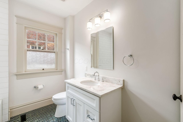 37 W 2nd Ave, Columbus, OH 43201 - bathroom featuring vanity, toilet, and tile patterned floors