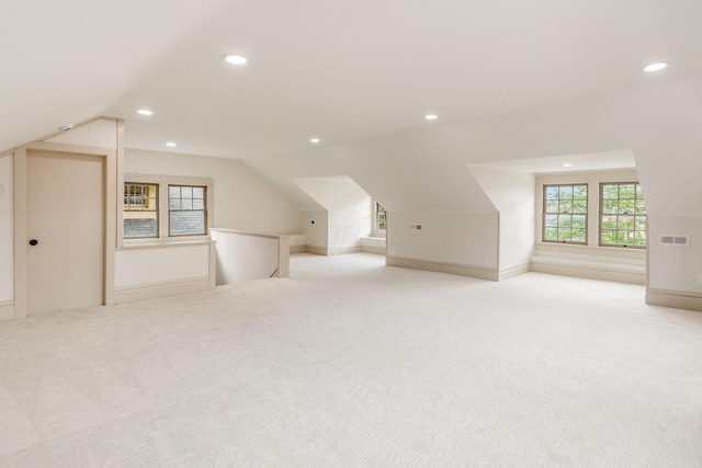 37 W 2nd Ave, Columbus, OH 43201 - additional living space with lofted ceiling, light colored carpet, recessed lighting, and baseboards