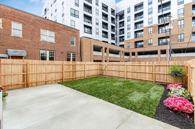 37 W 2nd Ave, Columbus, OH 43201 - fenced backyard featuring a patio area