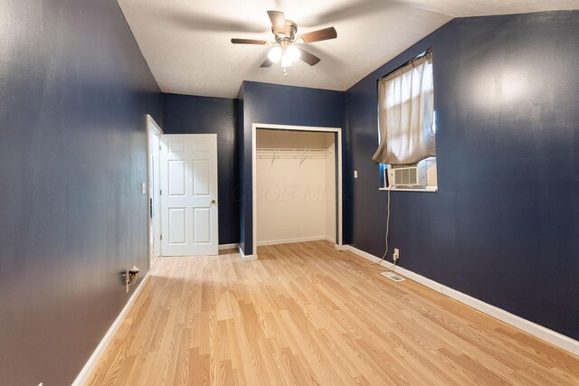 5103 Johnstown Alexandria Rd, Johnstown, OH 43031 - unfurnished bedroom with wood finished floors, cooling unit, baseboards, a closet, and lofted ceiling