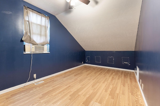 5103 Johnstown Alexandria Rd, Johnstown, OH 43031 - bonus room featuring wood finished floors, cooling unit, a ceiling fan, baseboards, and lofted ceiling