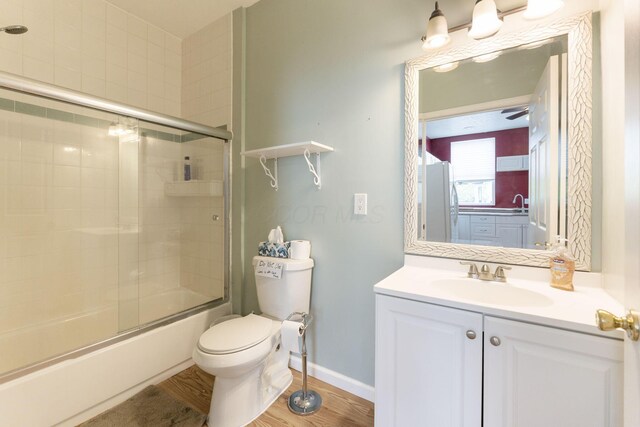 5103 Johnstown Alexandria Rd, Johnstown, OH 43031 - full bath featuring toilet, vanity, enclosed tub / shower combo, and baseboards