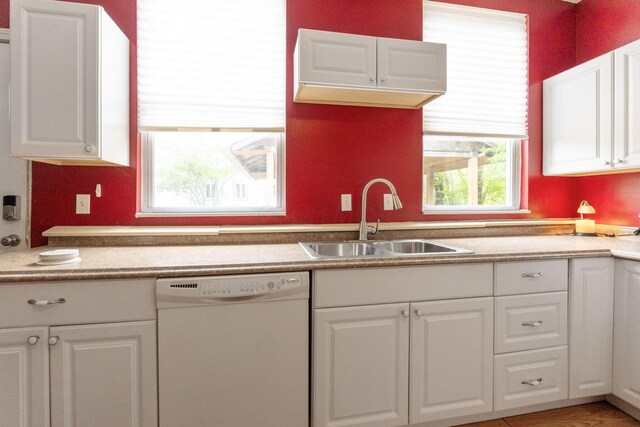 5103 Johnstown Alexandria Rd, Johnstown, OH 43031 - kitchen with dishwasher, a sink, and white cabinetry