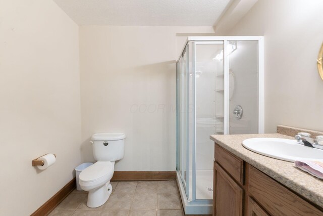 5103 Johnstown Alexandria Rd, Johnstown, OH 43031 - full bathroom with vanity, a stall shower, baseboards, toilet, and tile patterned floors