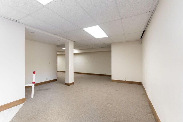 5103 Johnstown Alexandria Rd, Johnstown, OH 43031 - finished basement with a paneled ceiling, light carpet, and baseboards