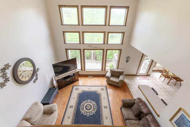 5103 Johnstown Alexandria Rd, Johnstown, OH 43031 - living area with wood finished floors and a towering ceiling