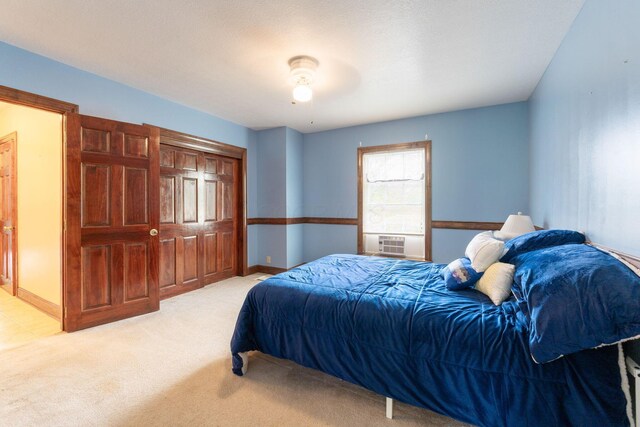 5103 Johnstown Alexandria Rd, Johnstown, OH 43031 - bedroom featuring light carpet, cooling unit, baseboards, and a closet