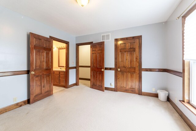 5103 Johnstown Alexandria Rd, Johnstown, OH 43031 - unfurnished bedroom with light carpet, baseboards, and ensuite bathroom