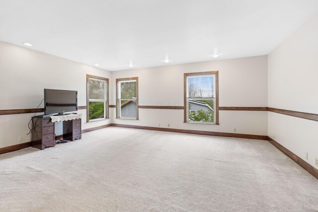5103 Johnstown Alexandria Rd, Johnstown, OH 43031 - unfurnished living room with light carpet, baseboards, and recessed lighting
