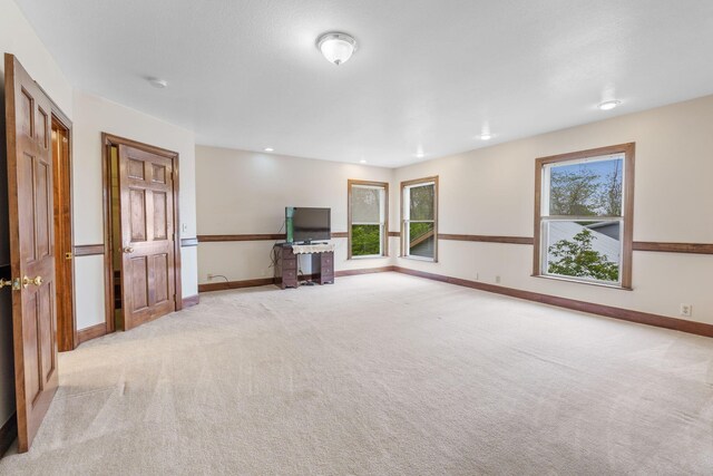 5103 Johnstown Alexandria Rd, Johnstown, OH 43031 - unfurnished living room with light colored carpet and baseboards