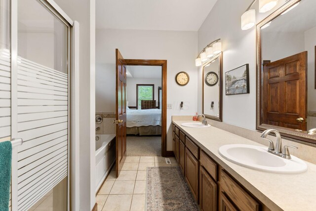 5103 Johnstown Alexandria Rd, Johnstown, OH 43031 - bathroom featuring tile patterned floors, double vanity, ensuite bath, and a bath