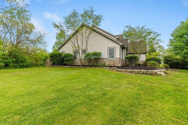 5103 Johnstown Alexandria Rd, Johnstown, OH 43031 - view of property exterior with stone siding and a yard