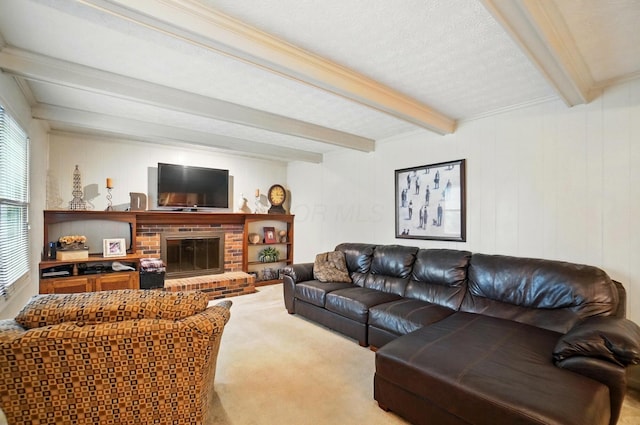 2517 Slateshire Dr, Dublin, OH 43016 - carpeted living area with beamed ceiling and a brick fireplace