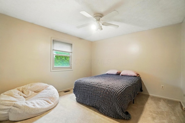 2517 Slateshire Dr, Dublin, OH 43016 - carpeted bedroom with baseboards and a ceiling fan