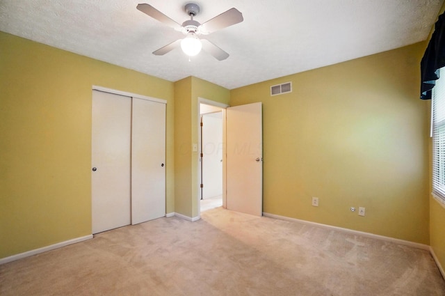 2517 Slateshire Dr, Dublin, OH 43016 - unfurnished bedroom with light colored carpet, a closet, and baseboards