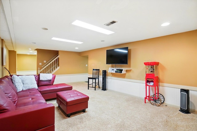 2517 Slateshire Dr, Dublin, OH 43016 - carpeted living room featuring wainscoting, stairs, and recessed lighting