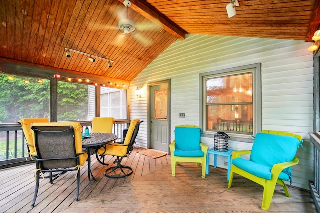 2517 Slateshire Dr, Dublin, OH 43016 - sunroom / solarium featuring rail lighting, vaulted ceiling, wood-type flooring, wood walls, and plenty of natural light