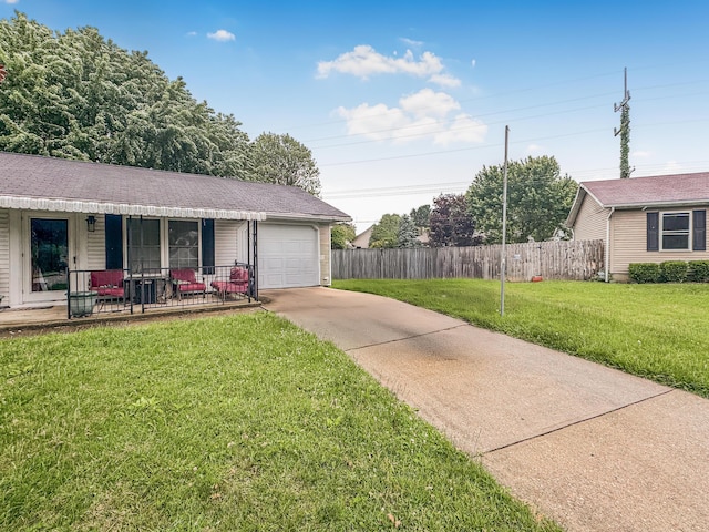 435 Alison Ct, Lancaster, OH 43130 - view of yard featuring concrete driveway, a garage, and covered porch
