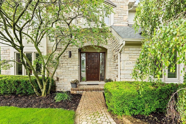 4606 Gershwin Ct, Grove City, OH 43123 - entrance to property with stone siding and a shingled roof