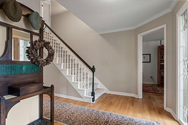 4606 Gershwin Ct, Grove City, OH 43123 - staircase with wood finished floors, ornamental molding, and baseboards