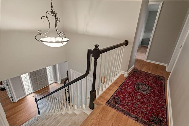 4606 Gershwin Ct, Grove City, OH 43123 - stairway with wood finished floors and baseboards