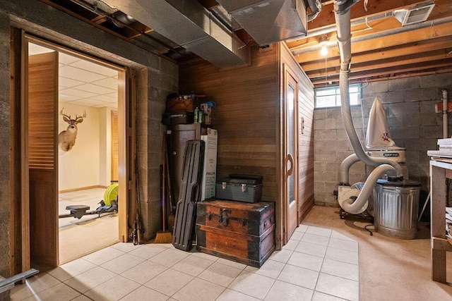 4606 Gershwin Ct, Grove City, OH 43123 - basement featuring light tile patterned floors and wooden walls