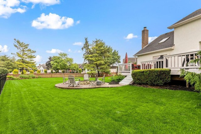4606 Gershwin Ct, Grove City, OH 43123 - view of yard featuring an outdoor fire pit, a wooden deck, and a patio area