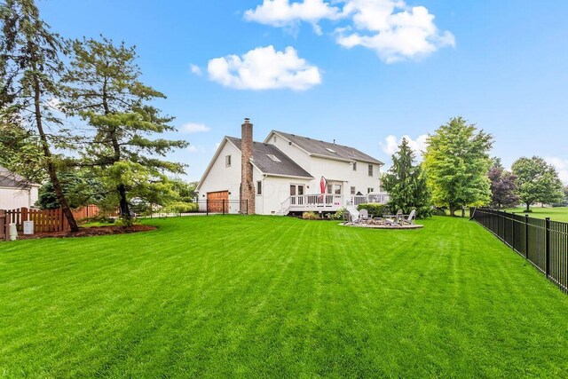 4606 Gershwin Ct, Grove City, OH 43123 - rear view of house with a deck and a chimney