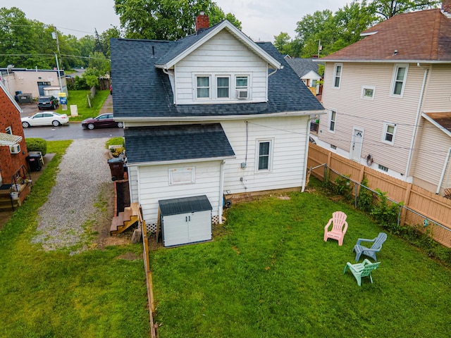 236 Ruth Ave, Mansfield, OH 44907 - rear view of house featuring roof with shingles and stairway