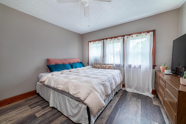 236 Ruth Ave, Mansfield, OH 44907 - bedroom with dark wood-style flooring, baseboards, and ceiling fan