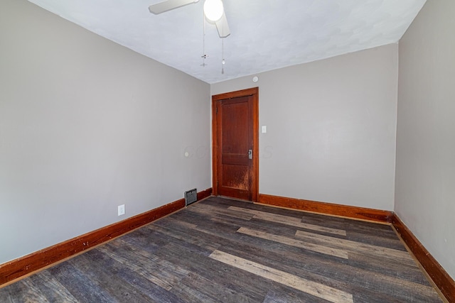 236 Ruth Ave, Mansfield, OH 44907 - spare room with dark wood-type flooring, baseboards, and a ceiling fan