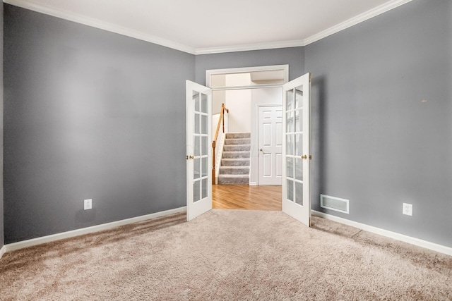 7985 Eric Ct, Lewis Center, OH 43035 - unfurnished room with french doors, carpet, ornamental molding, and baseboards