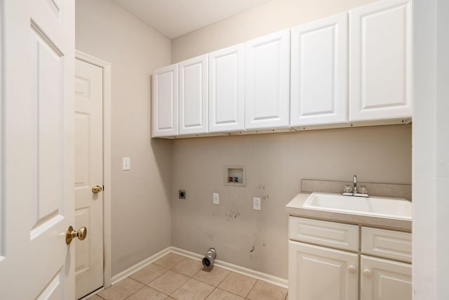 7985 Eric Ct, Lewis Center, OH 43035 - laundry room featuring cabinet space, washer hookup, electric dryer hookup, baseboards, and light tile patterned flooring