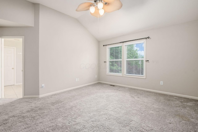 7985 Eric Ct, Lewis Center, OH 43035 - unfurnished room featuring carpet, lofted ceiling, ceiling fan, and baseboards