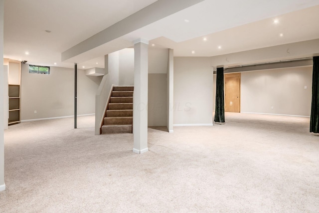 7985 Eric Ct, Lewis Center, OH 43035 - basement with carpet, recessed lighting, stairway, and baseboards
