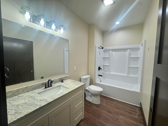 1624 Marlboro Ave, Obetz, OH 43207 - bathroom with wood finished floors, vanity, and tub / shower combination