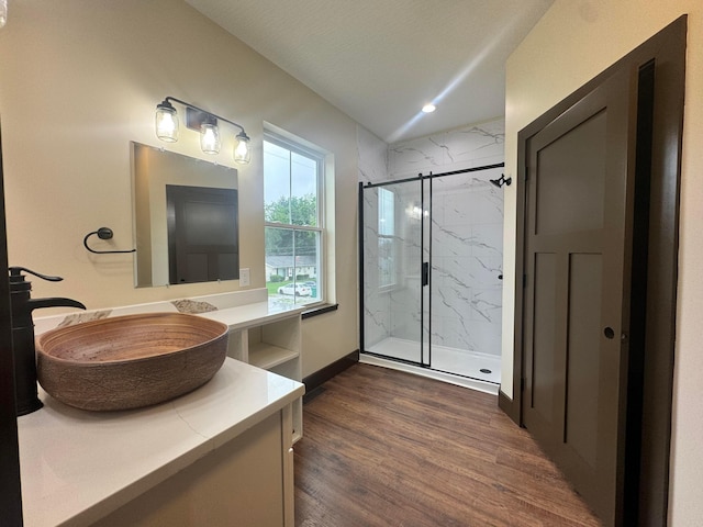 1624 Marlboro Ave, Obetz, OH 43207 - full bath featuring a marble finish shower, vanity, and wood finished floors