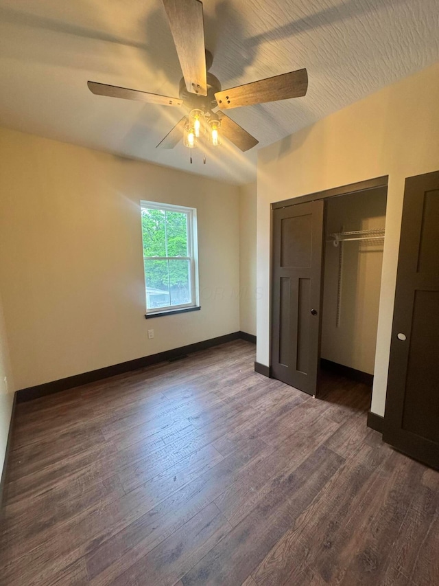 1624 Marlboro Ave, Obetz, OH 43207 - unfurnished bedroom with dark wood-style floors and ceiling fan