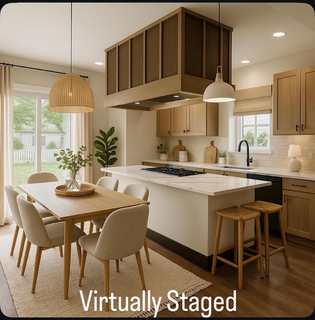 1624 Marlboro Ave, Obetz, OH 43207 - kitchen with gas cooktop, tasteful backsplash, plenty of natural light, wood finished floors, and recessed lighting