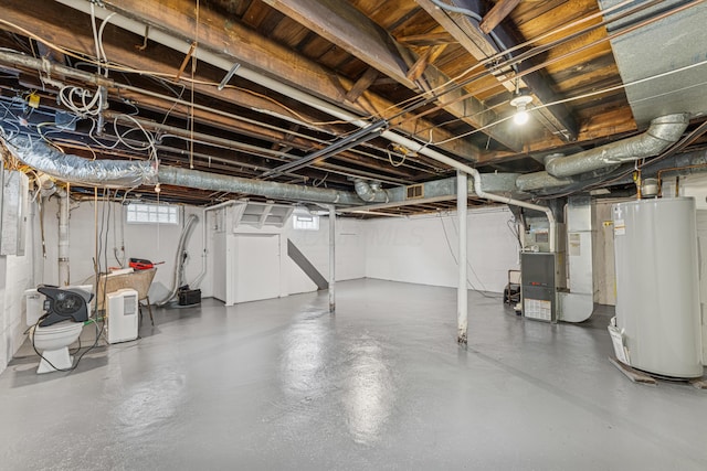 211 Guernsey Ave, Columbus, OH 43204 - basement featuring water heater and heating unit