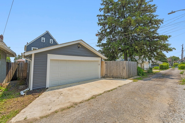 211 Guernsey Ave, Columbus, OH 43204 - garage featuring concrete driveway