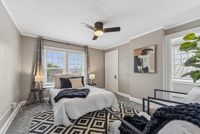 211 Guernsey Ave, Columbus, OH 43204 - bedroom with carpet floors, crown molding, a ceiling fan, and baseboards
