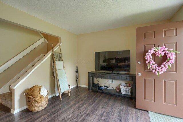 7581-7583 Pickett Ln Unit 83, Columbus, OH 43235 - living room with wood finished floors, stairway, and baseboards