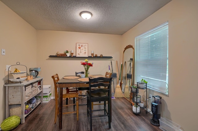 7581-7583 Pickett Ln Unit 83, Columbus, OH 43235 - dining space featuring dark wood finished floors, a textured ceiling, plenty of natural light, and baseboards